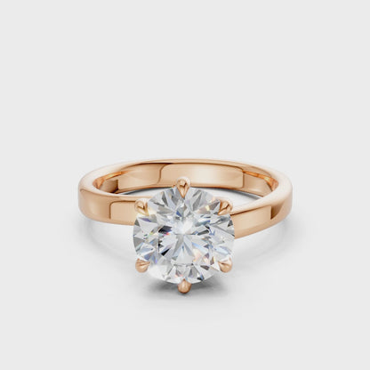 360° rotating video capturing the diamond’s fiery facets and the romantic luster of the rose gold setting.